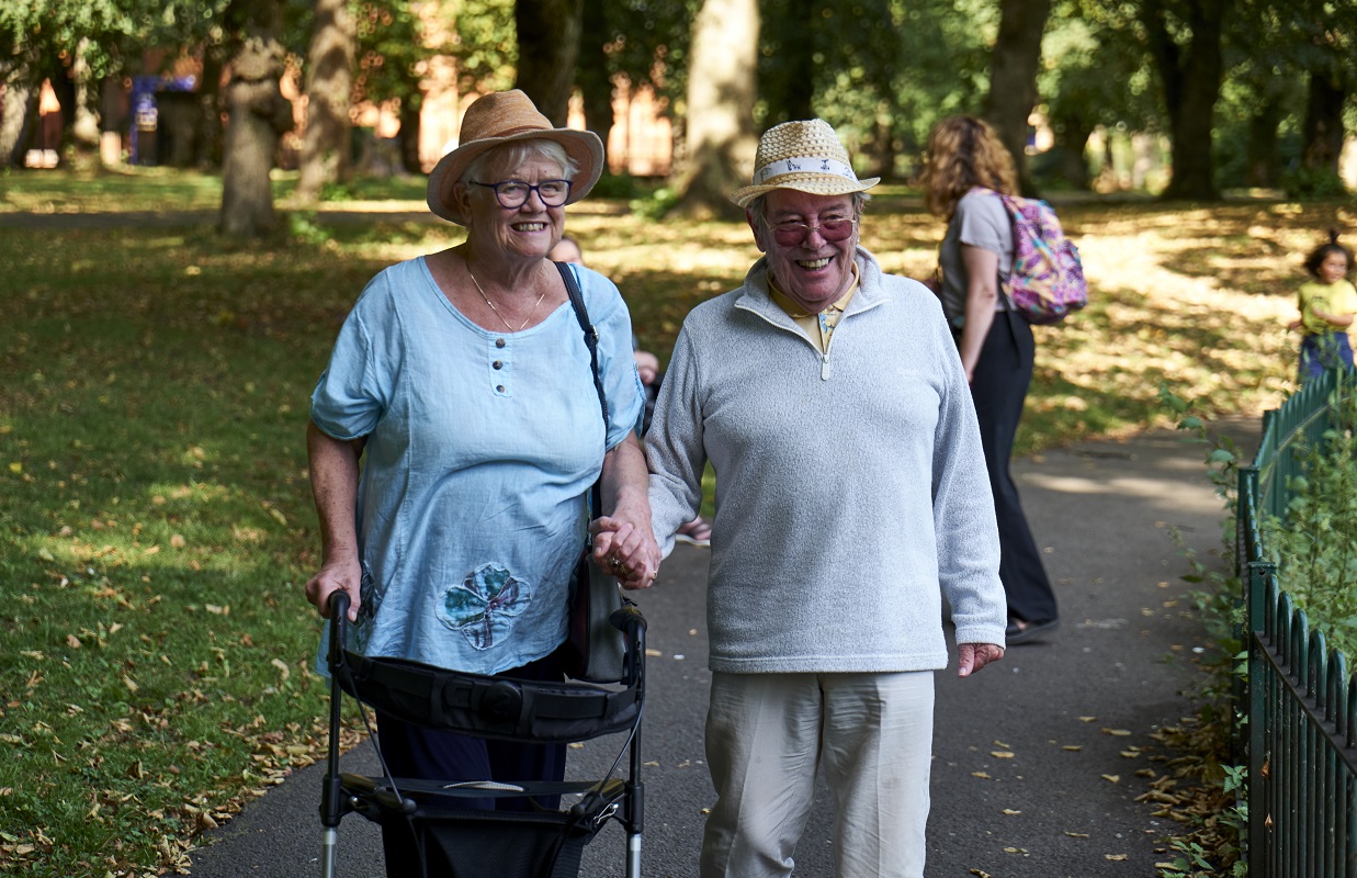 Older people walking together in park